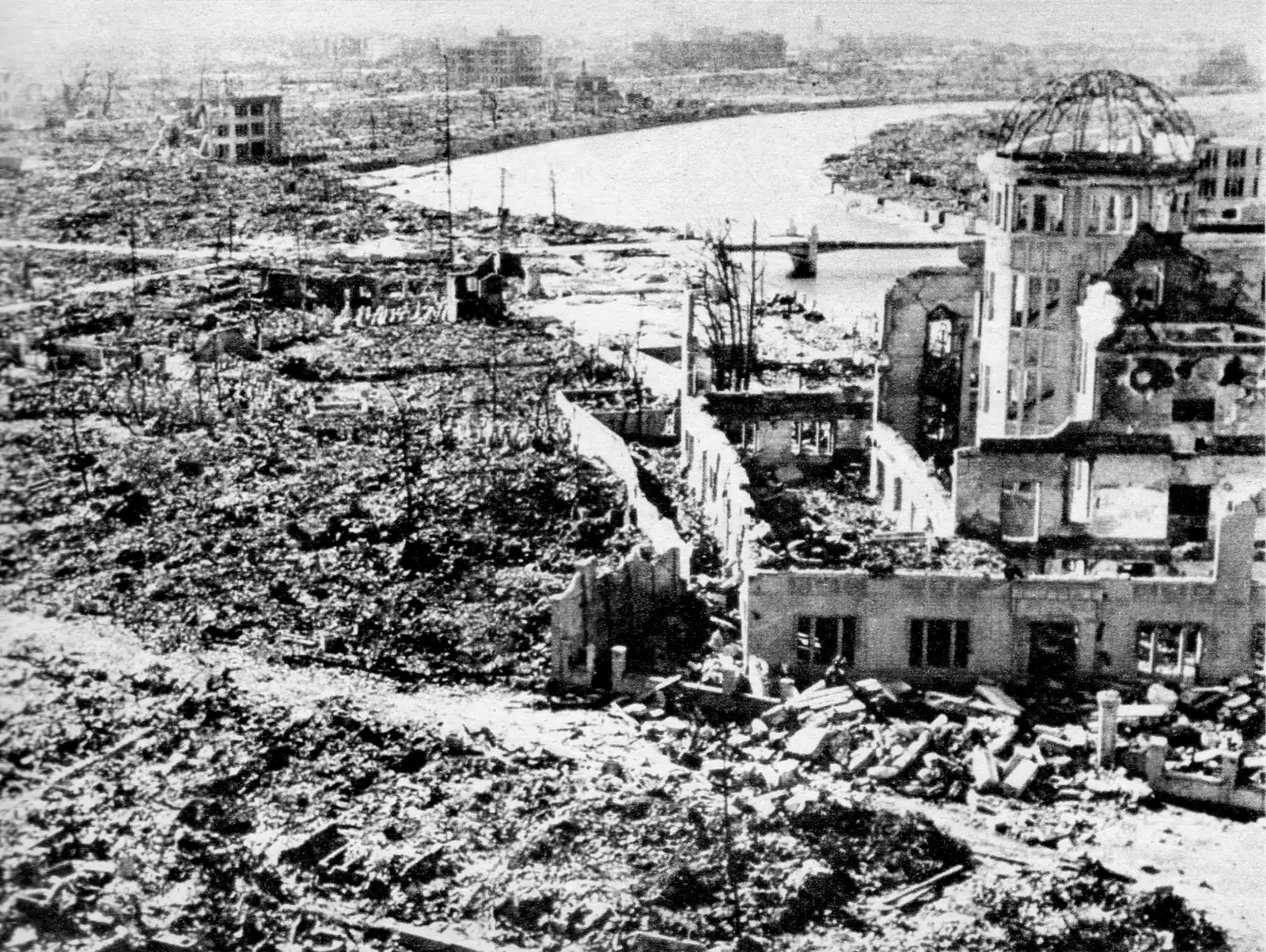 The ruined city around the Dome in about 1945, flattened buildings along the river with the Dome’s frame standing